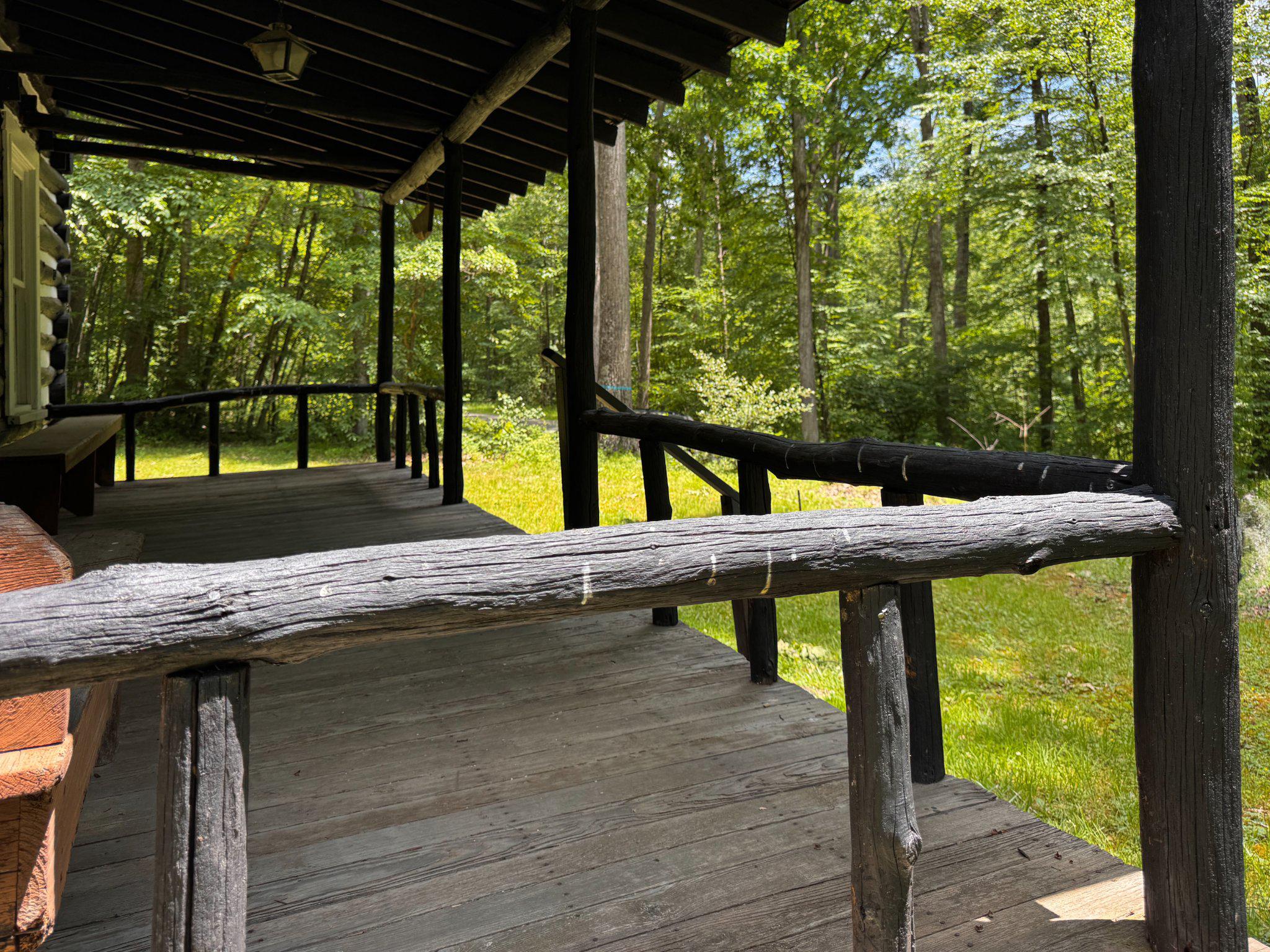 4464 Tram Road Spruce Creek, PA 16683 - Photo 5 of 53 a view of a patio with a table chairs and a swimming pool