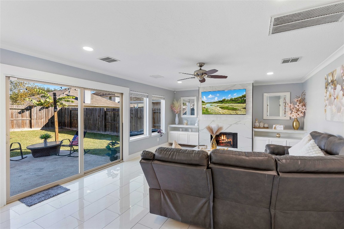405 Mystic Trail Loop Houston, TX 77339 - Photo 12 of 44 a living room with furniture and a large window