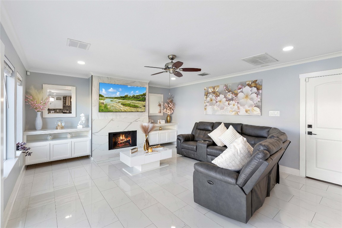405 Mystic Trail Loop Houston, TX 77339 - Photo 13 of 44 a living room with furniture and a fireplace