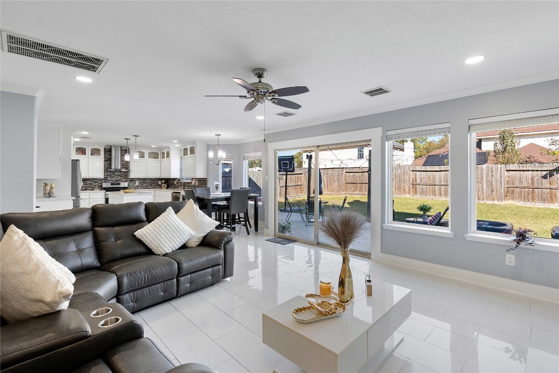 405 Mystic Trail Loop Houston, TX 77339 - Photo 15 of 44 a living room with furniture and a large window