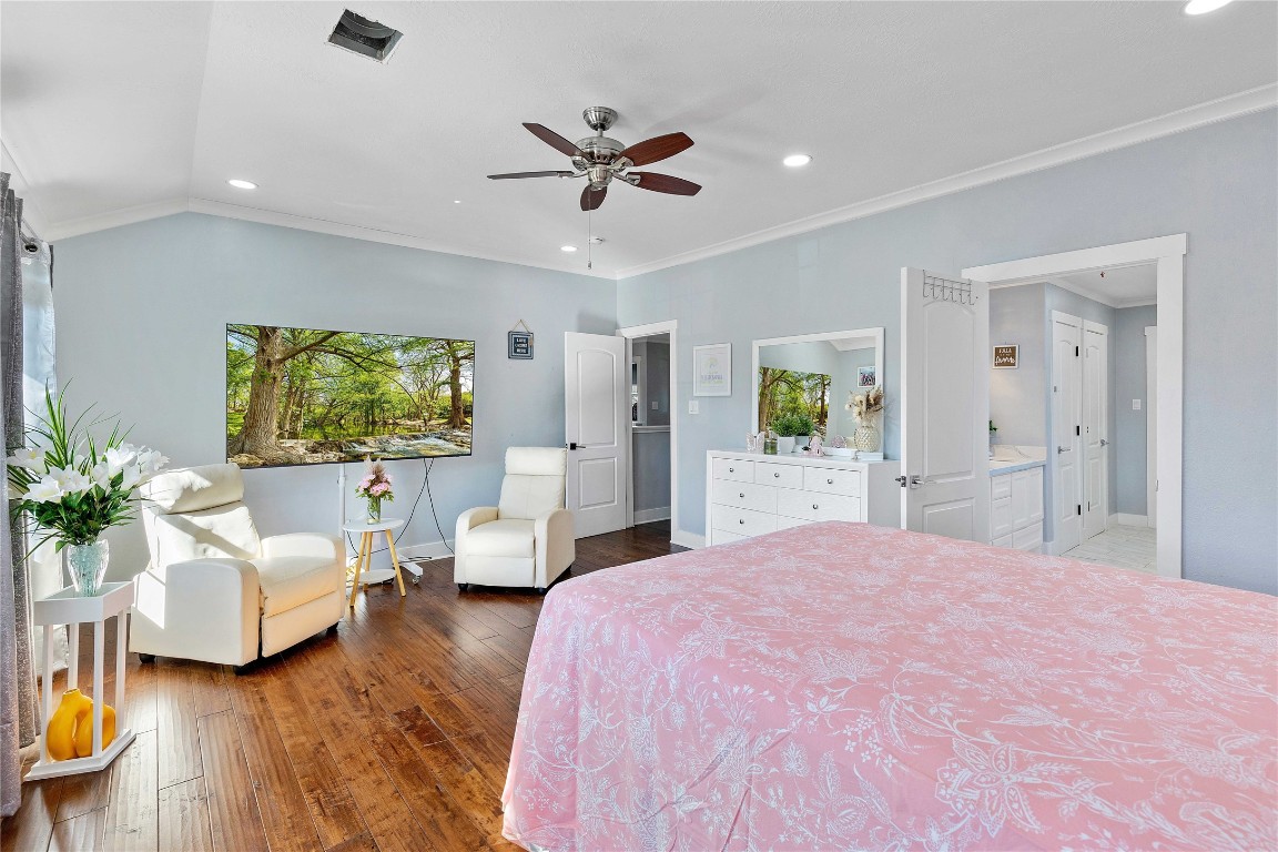 405 Mystic Trail Loop Houston, TX 77339 - Photo 23 of 44 a bedroom with a bed couches and white walls