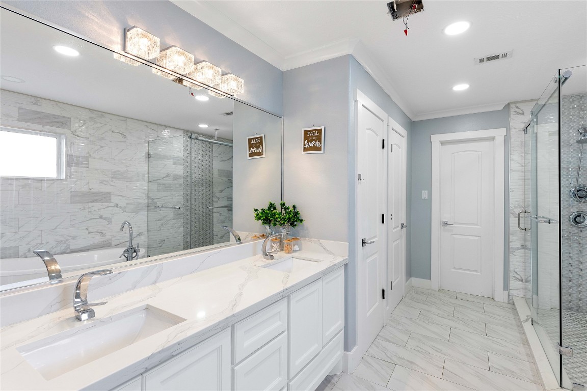 405 Mystic Trail Loop Houston, TX 77339 - Photo 25 of 44 a bathroom with a double vanity sink mirror and shower