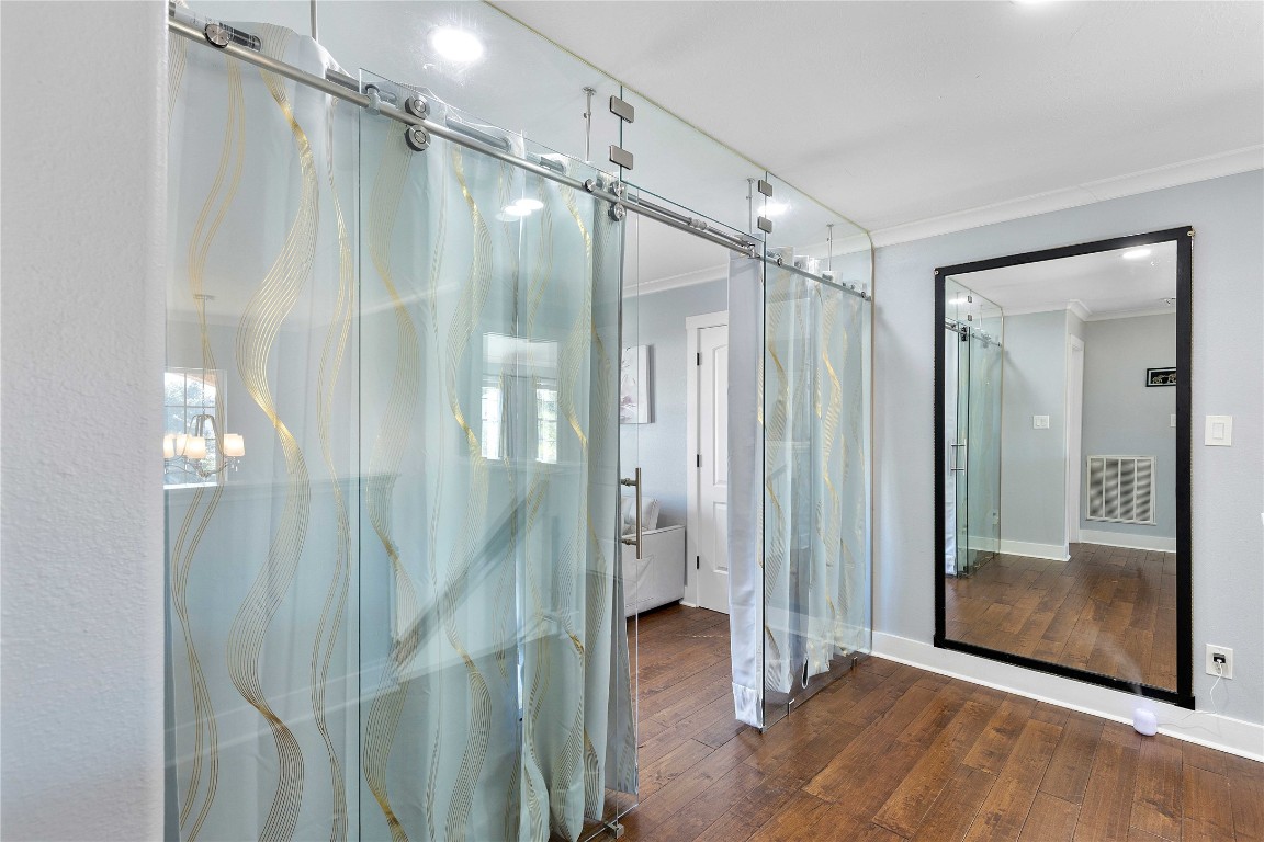 405 Mystic Trail Loop Houston, TX 77339 - Photo 30 of 44 a bathroom with a glass shower door and a glass door