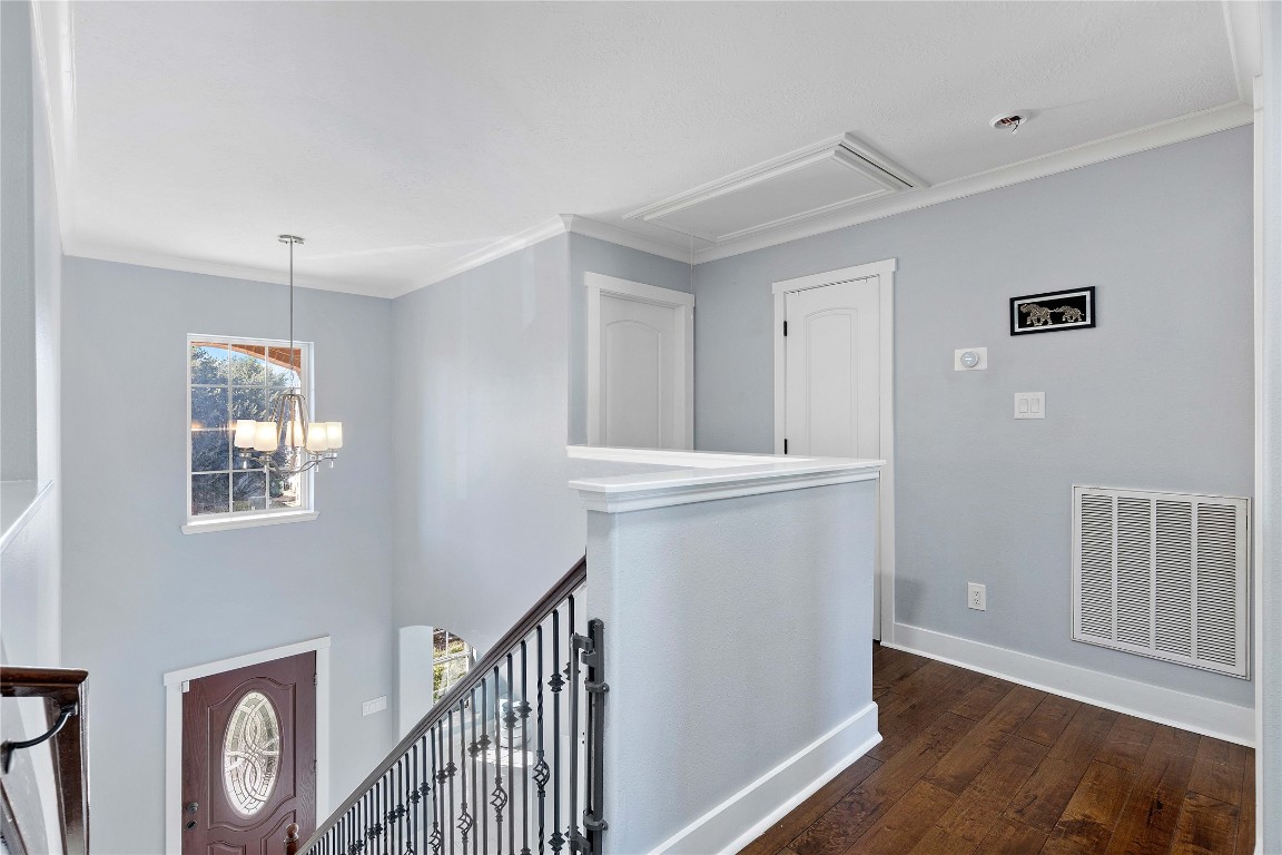 405 Mystic Trail Loop Houston, TX 77339 - Photo 31 of 44 a view of hallway with wooden floor and fan
