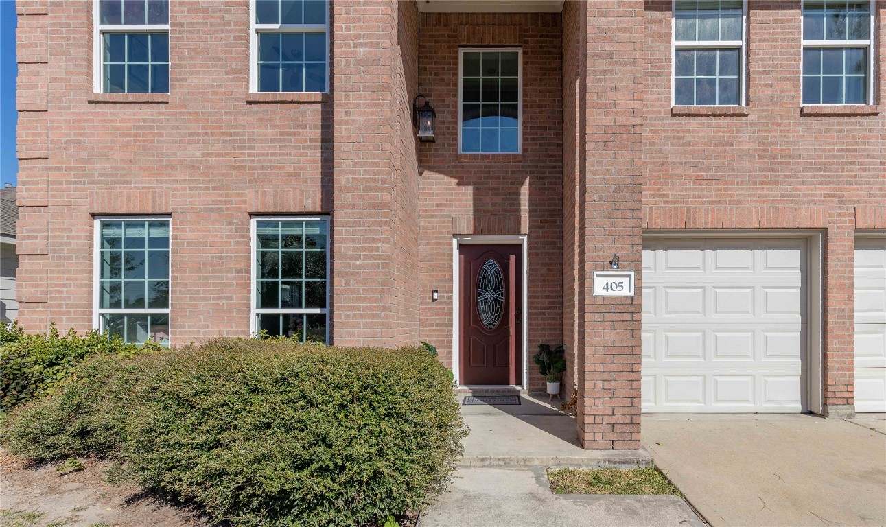 405 Mystic Trail Loop Houston, TX 77339 - Photo 44 of 44 a view of a brick house with a large windows