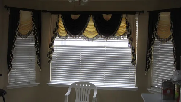 a view of a balcony and front door