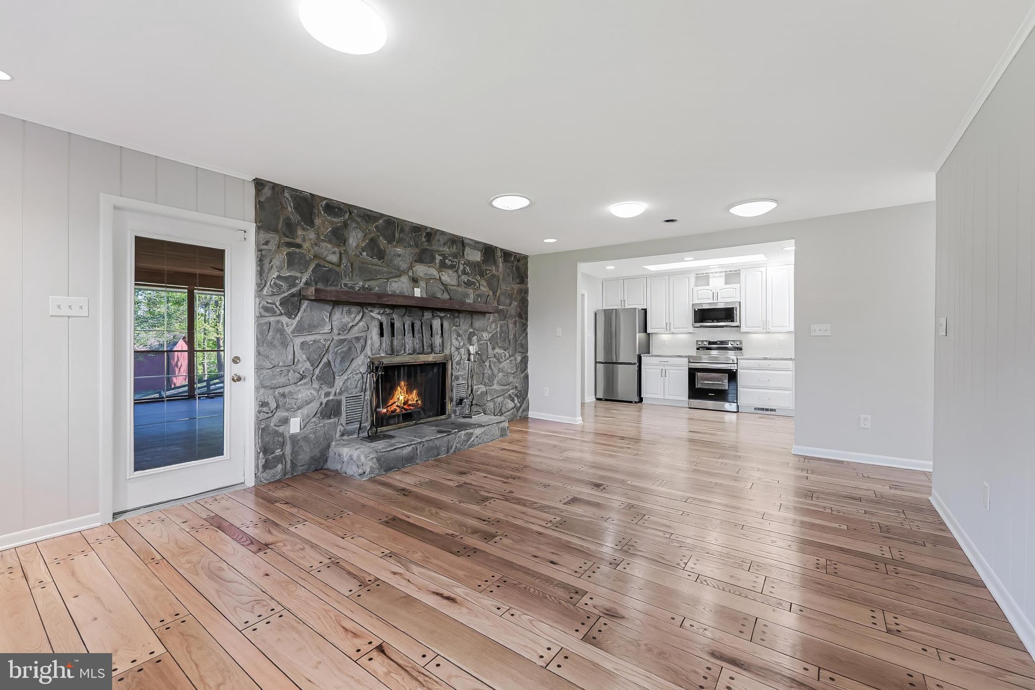 6891 Wilson Road Marshall, VA 20115 - Photo 56 of 118 Cozy living space with stone fireplace.