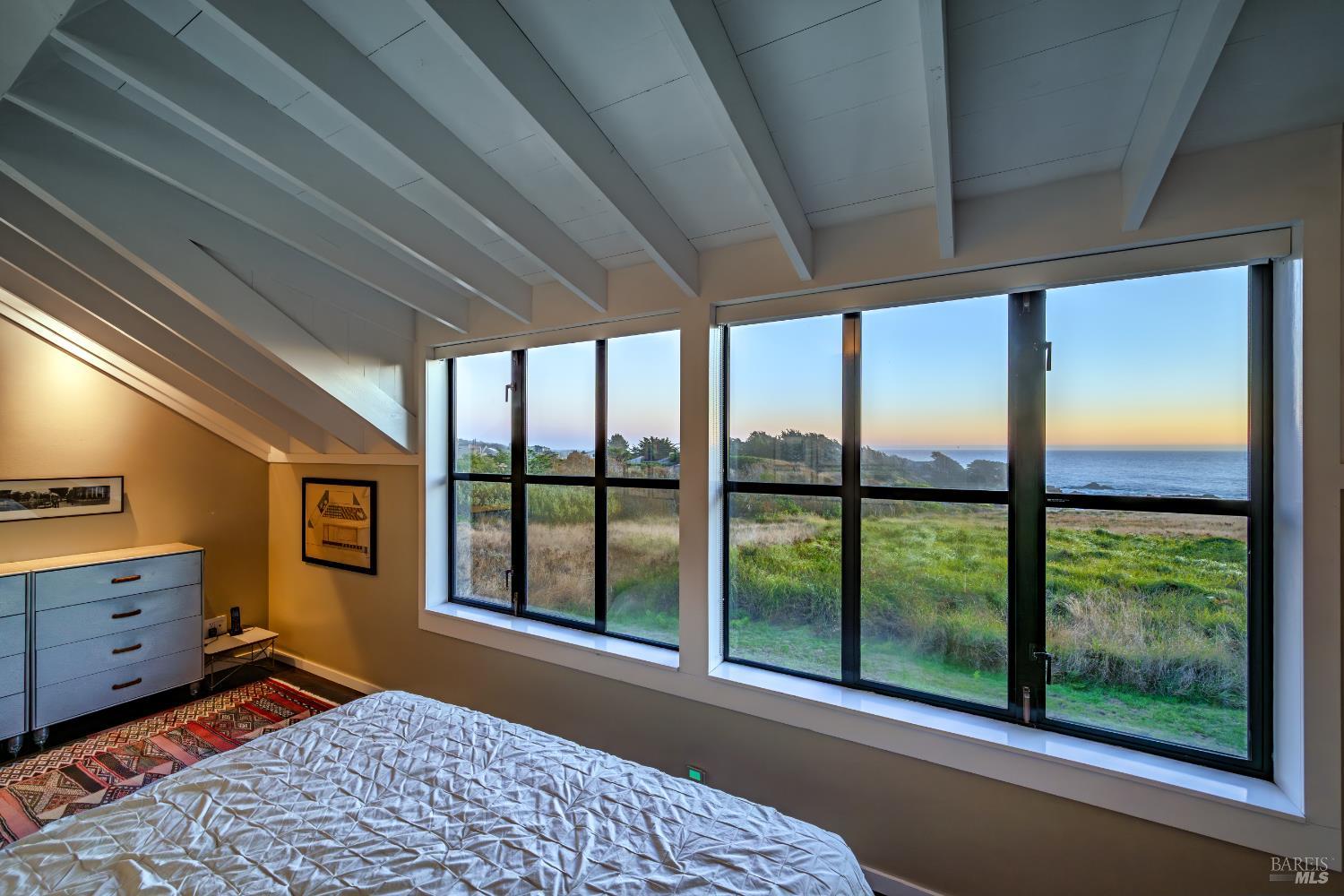 36690 Mariners Drive The Sea Ranch, CA 95497 - Photo 16 of 73 Upstairs primary bedroom with panoramic ocean views of Smugglers Cove.