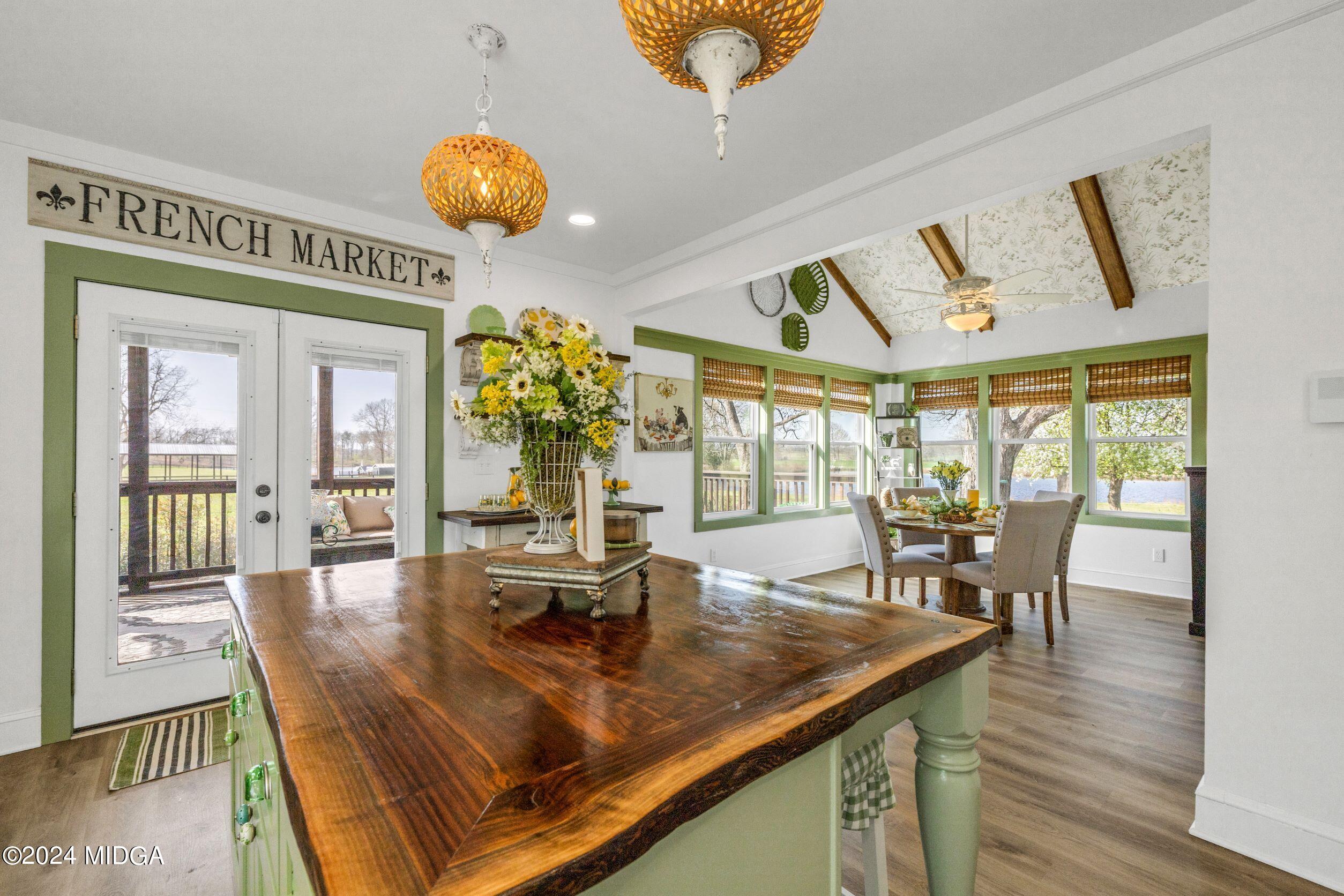 475 Brent Road Barnesville, GA 30204 - Photo 116 of 132 a view of a dining room with furniture and wooden floor