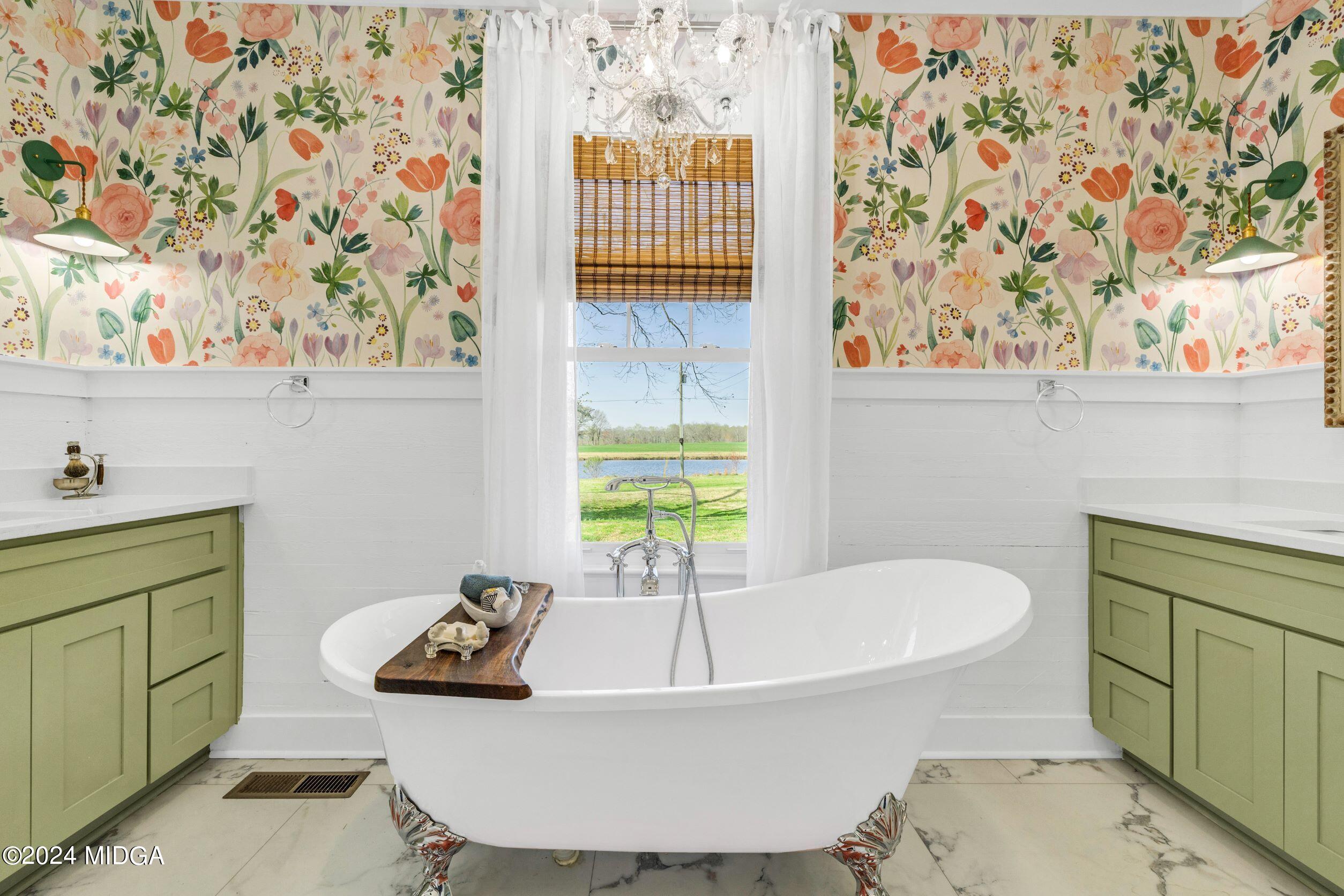 475 Brent Road Barnesville, GA 30204 - Photo 123 of 132 a white bath tub sitting next to a bathroom sink