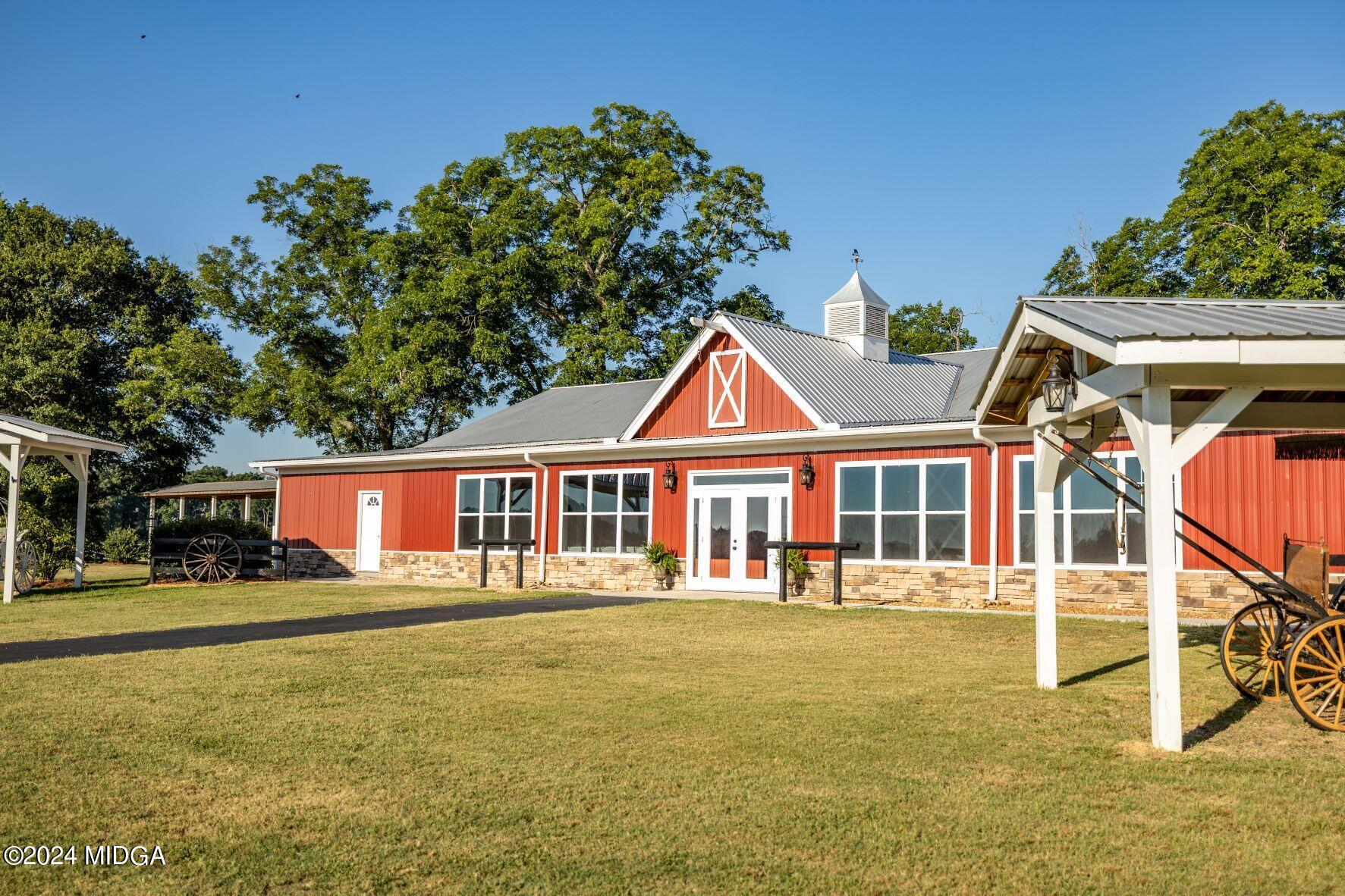 475 Brent Road Barnesville, GA 30204 - Photo 132 of 132 front view of a house with a yard