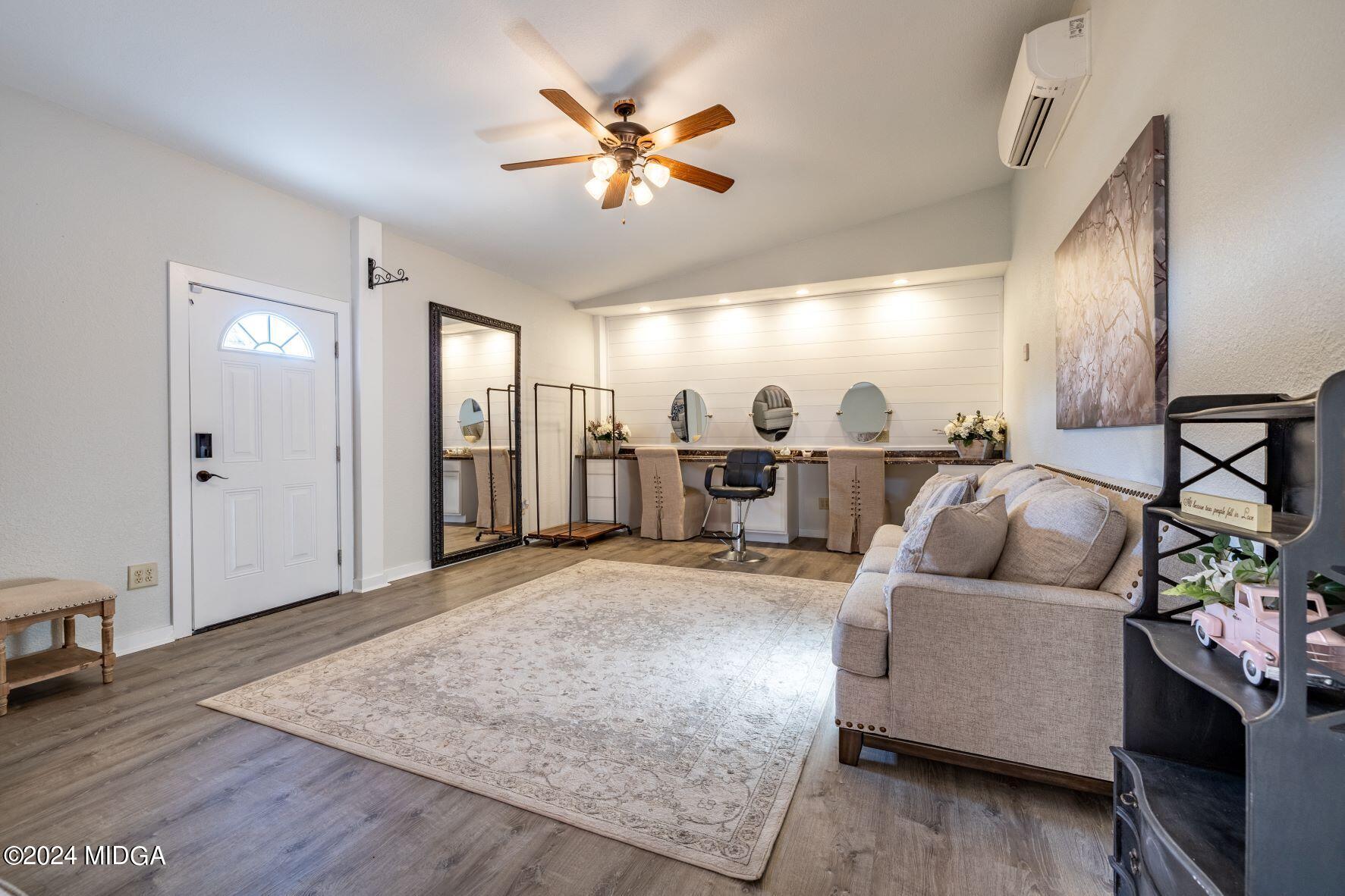 475 Brent Road Barnesville, GA 30204 - Photo 48 of 132 a living room with furniture and a wooden floor