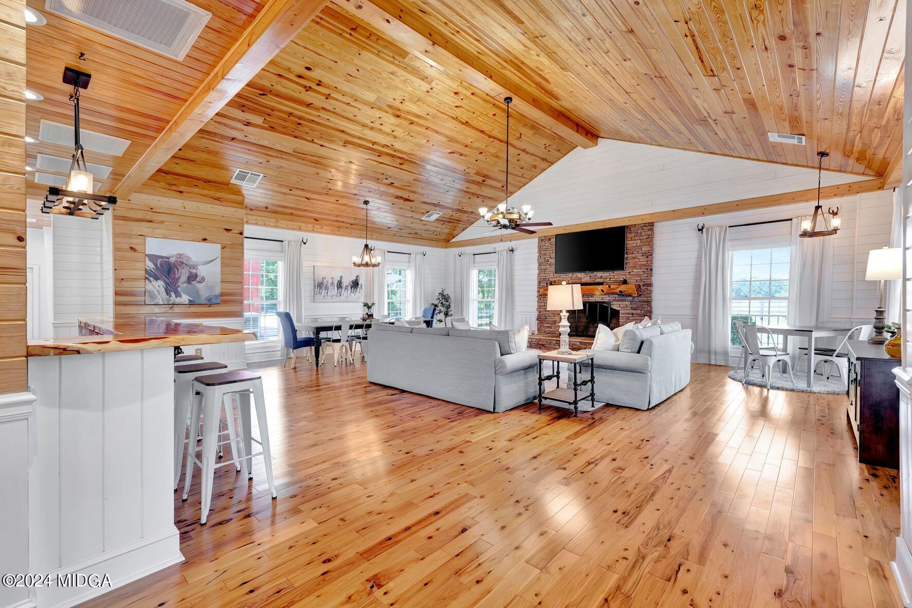 475 Brent Road Barnesville, GA 30204 - Photo 62 of 132 a living room with furniture and a wooden floor