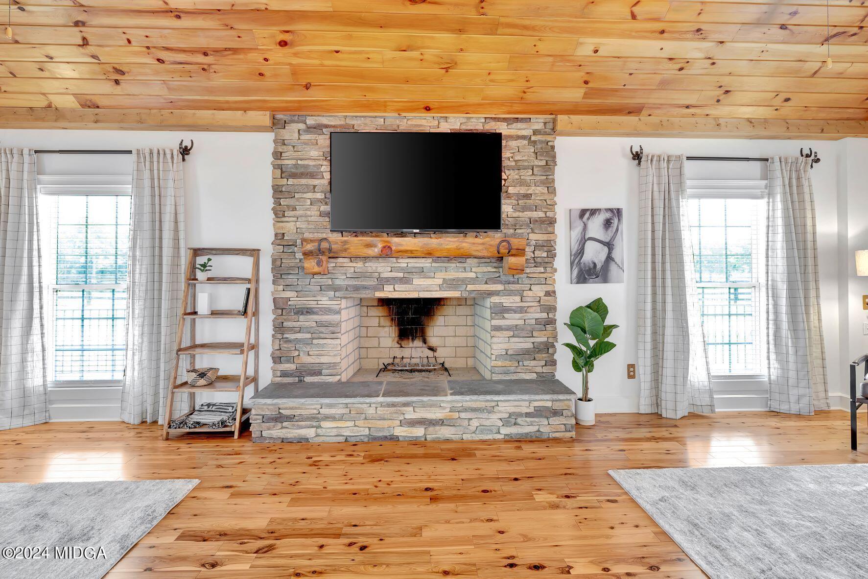 475 Brent Road Barnesville, GA 30204 - Photo 74 of 132 a view of living room with furniture and a flat screen tv