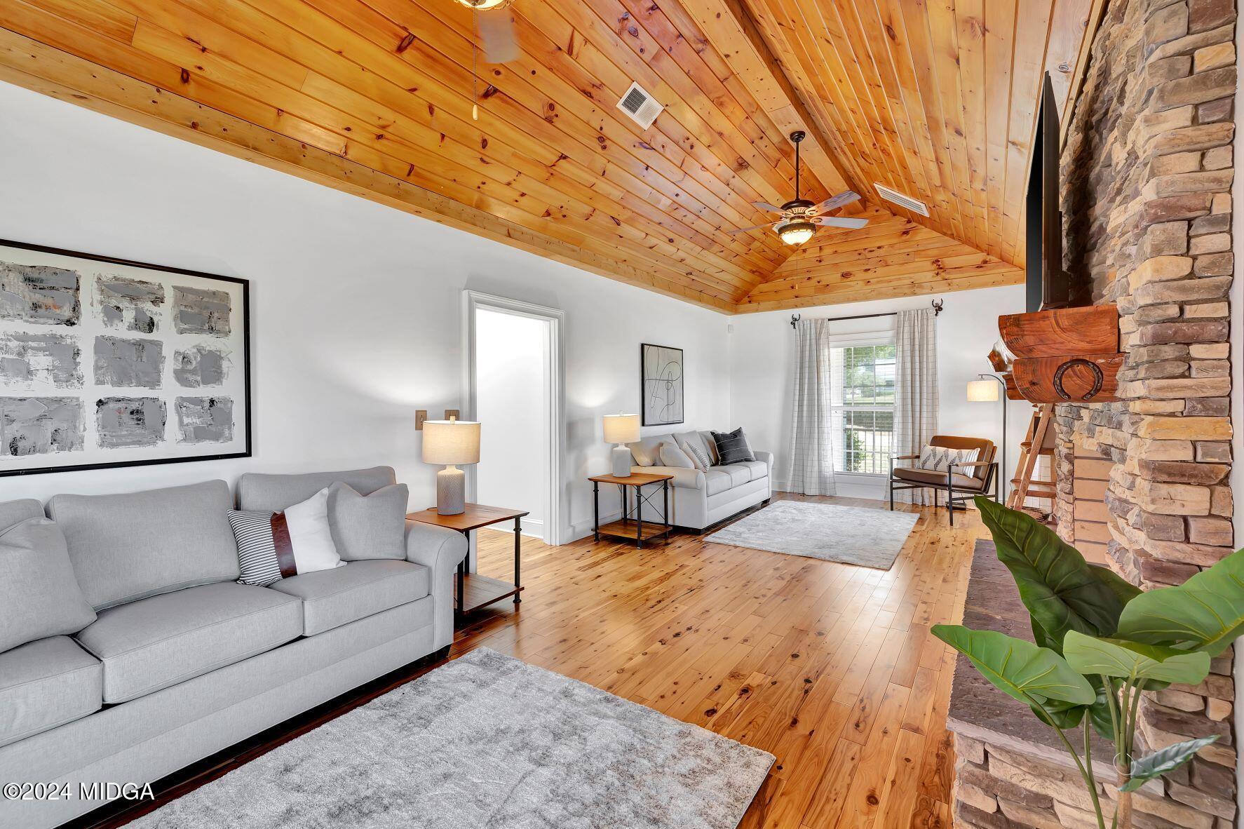 475 Brent Road Barnesville, GA 30204 - Photo 77 of 132 a living room with furniture and a large window