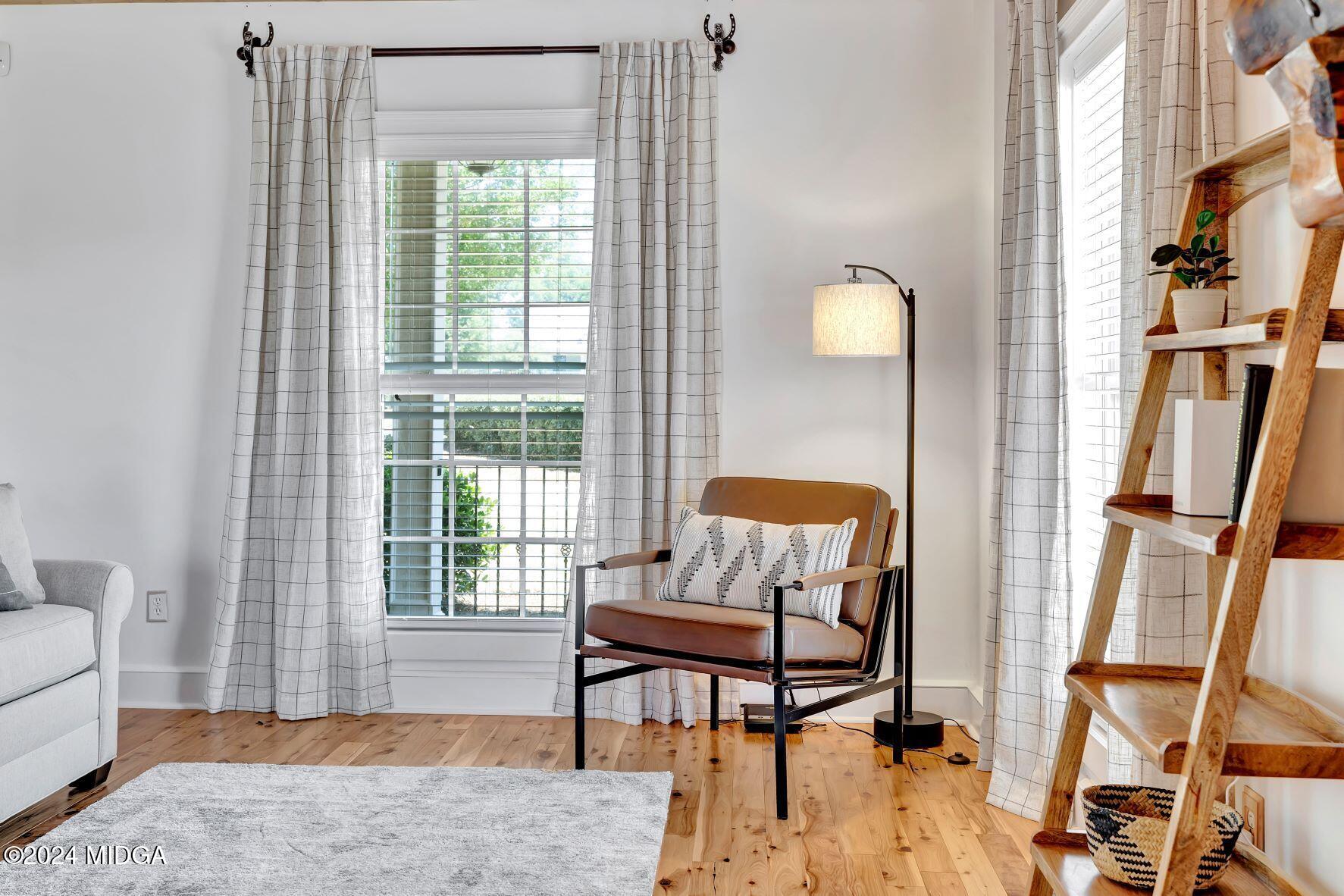 475 Brent Road Barnesville, GA 30204 - Photo 79 of 132 a living room with furniture and a window