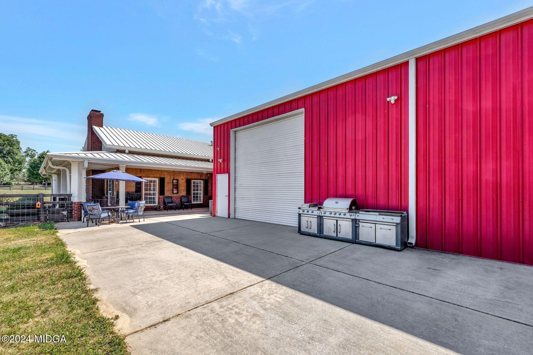 475 Brent Road Barnesville, GA 30204 - Photo 98 of 132 a view of a house with backyard porch and furniture