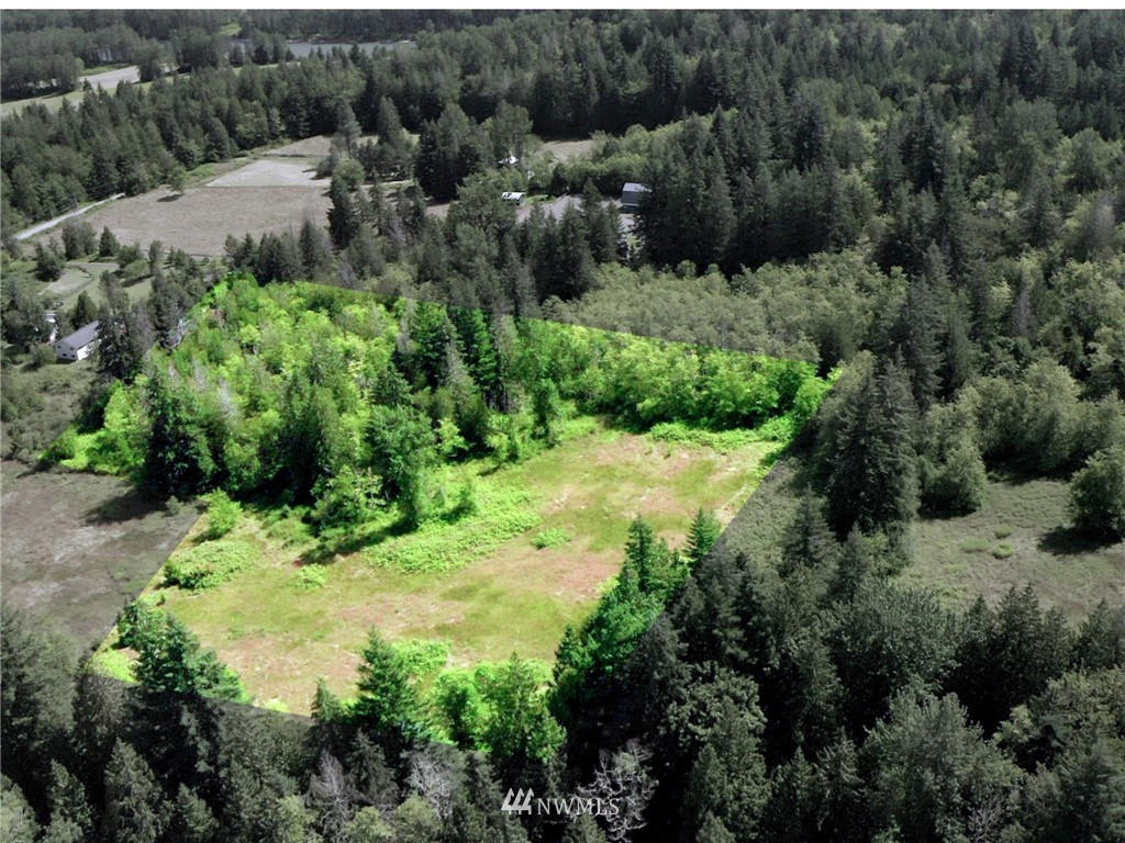 3793 East Smith Road Bellingham, WA 98226 - Photo 3 of 14 a view of a garden with a building