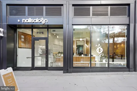 a view of a building with sitting area