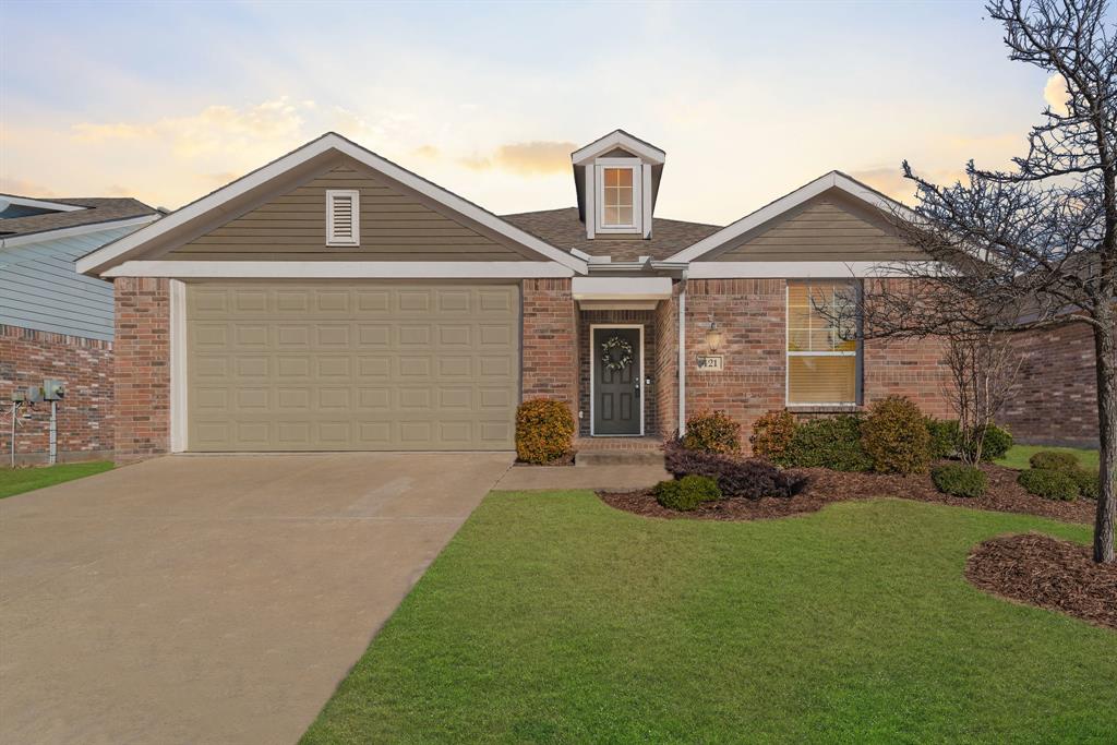 421 Allbright Road Celina, TX 75009 - Photo 1 of 1 a front view of a house with a yard and garage