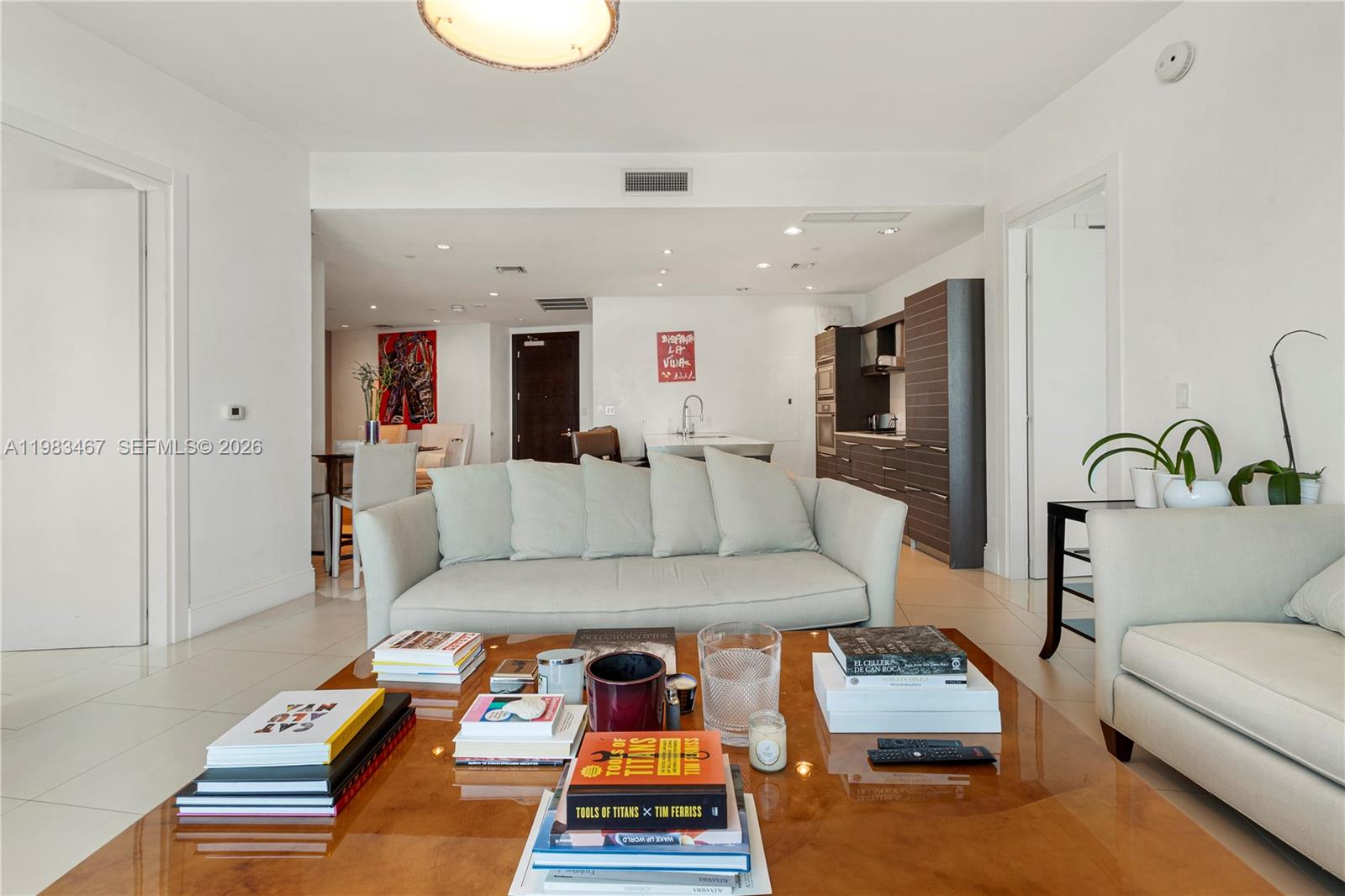 200 Biscayne Blvd Way, Unit 4907 Miami, FL 33131 - Photo 6 of 18 a living room with furniture and a table