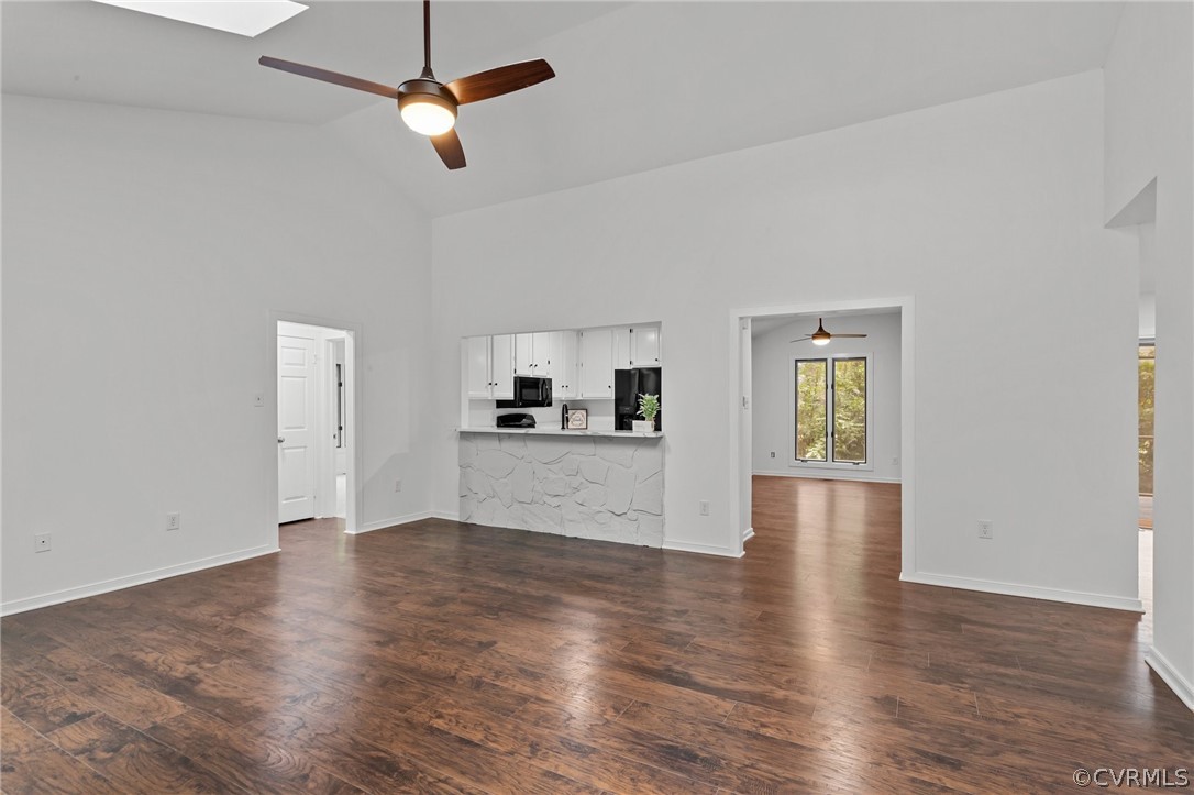 14307 Spring Gate Road Midlothian, VA 23112 - Photo 12 of 39 a view of empty room with wooden floor and ceiling fan