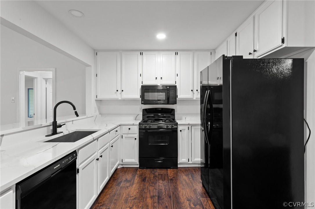 14307 Spring Gate Road Midlothian, VA 23112 - Photo 13 of 39 a kitchen with a refrigerator stove and sink