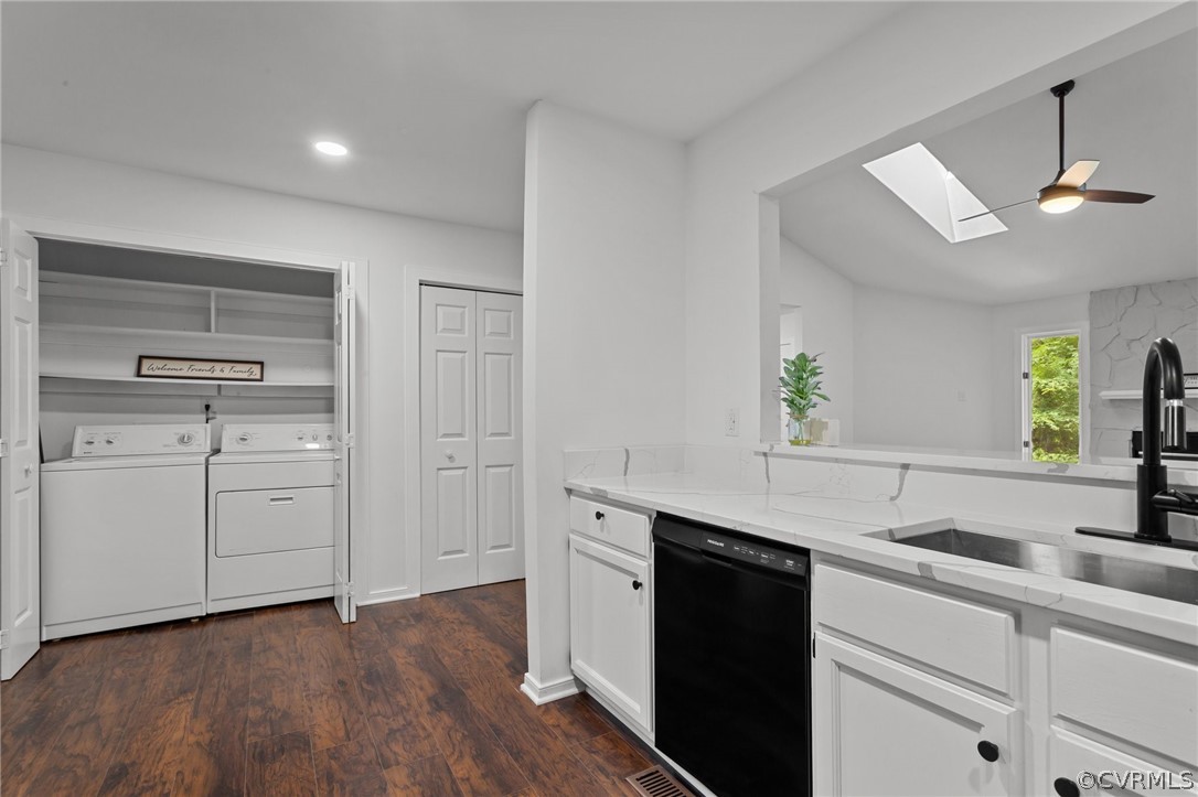14307 Spring Gate Road Midlothian, VA 23112 - Photo 14 of 39 a kitchen with a sink dishwasher and cabinets