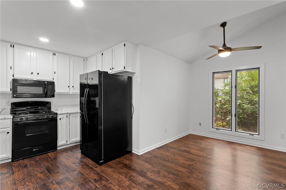 14307 Spring Gate Road Midlothian, VA 23112 - Photo 16 of 39 a kitchen with stainless steel appliances granite countertop a refrigerator and a stove top oven