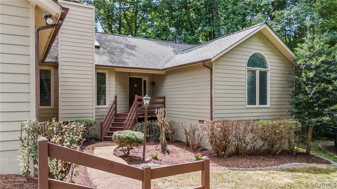 14307 Spring Gate Road Midlothian, VA 23112 - Photo 2 of 39 a front view of a house with garden
