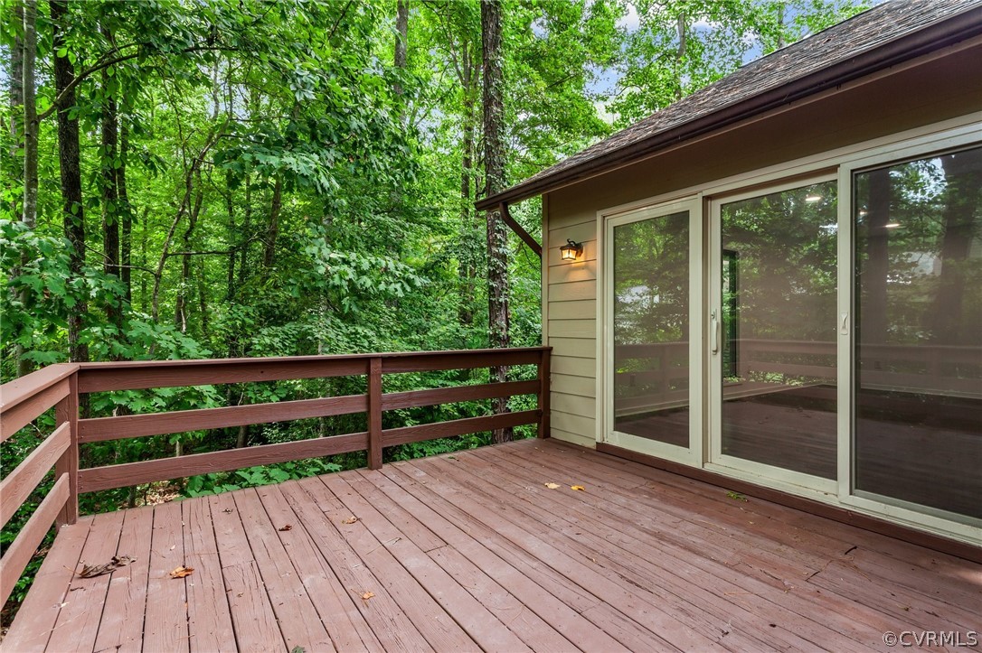 14307 Spring Gate Road Midlothian, VA 23112 - Photo 34 of 39 a balcony with wooden floor and outdoor space
