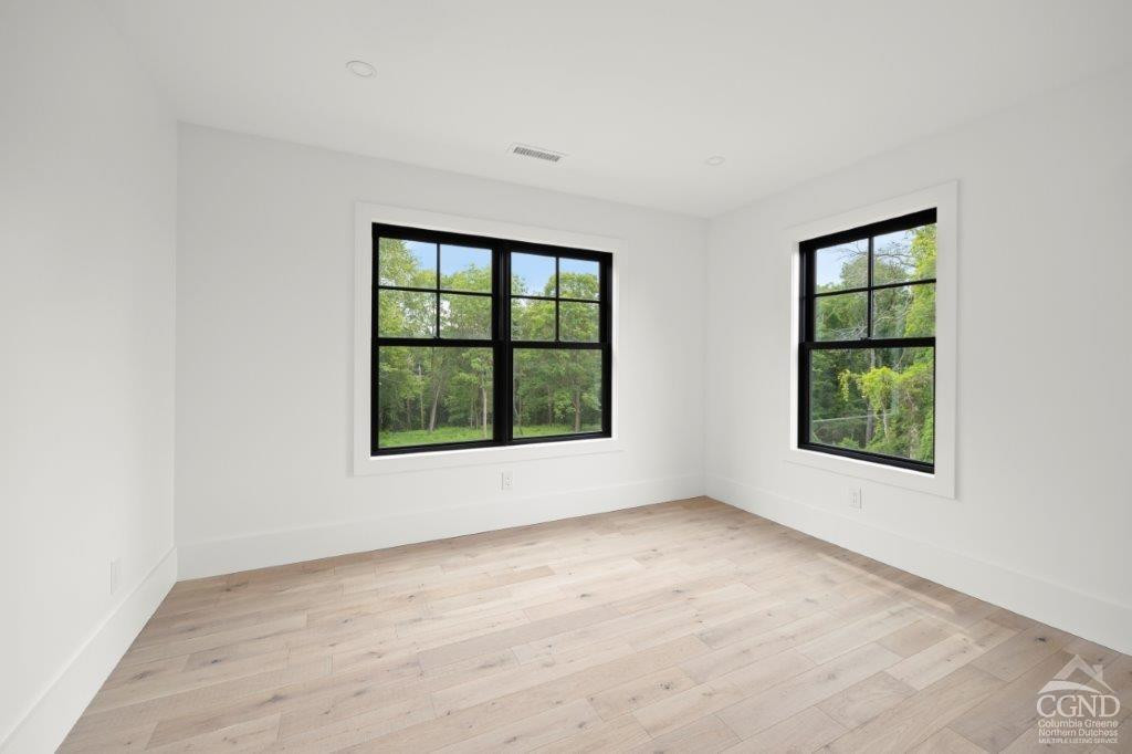 49 Snyder Pond Road Copake, NY 12516 - Photo 24 of 25 an empty room with windows