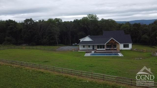 49 Snyder Pond Road Copake, NY 12516 - Photo 5 of 25 a view of a house with garden
