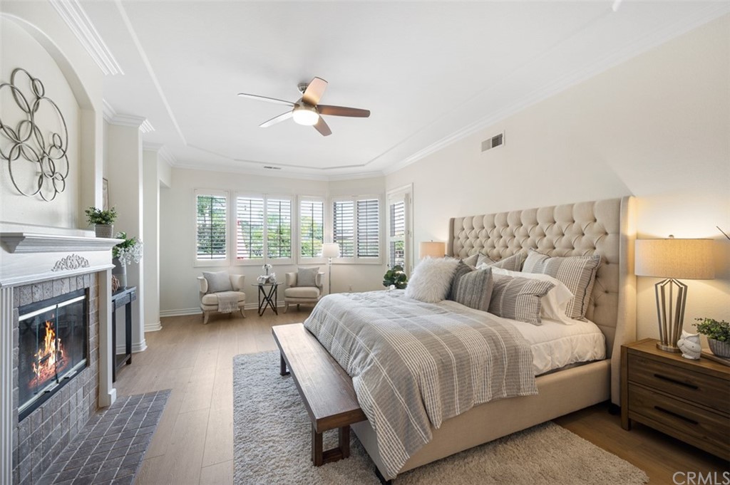 3724 Cedar Vale Way Fallbrook, CA 92028 - Photo 11 of 39 a bedroom with a bed and a fireplace