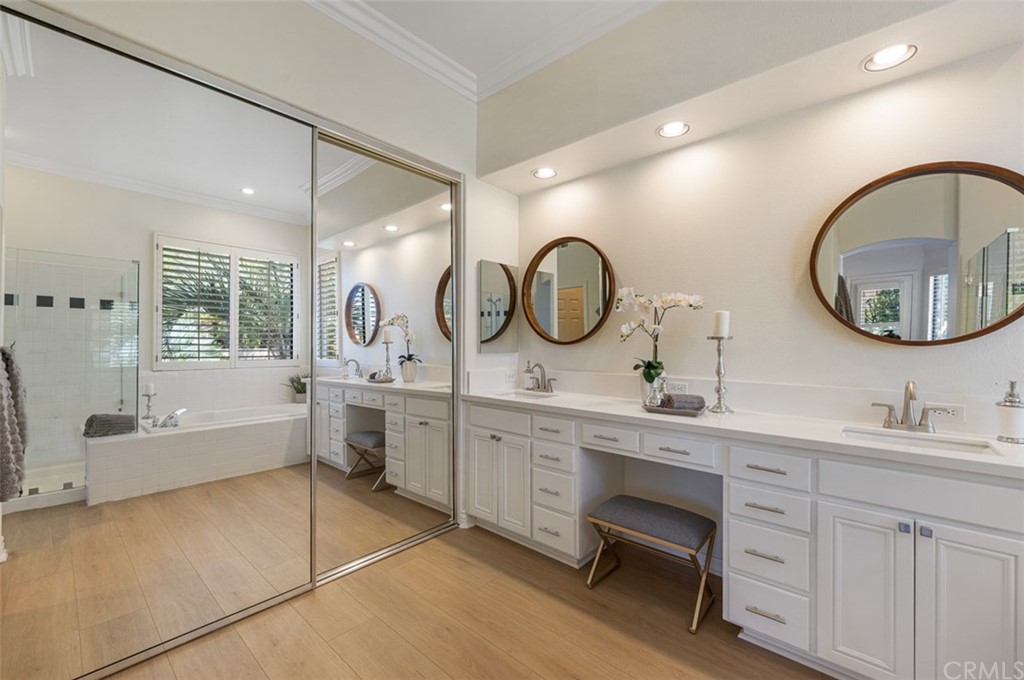 3724 Cedar Vale Way Fallbrook, CA 92028 - Photo 14 of 39 a spacious bathroom with a double vanity sink double mirror and bathtub