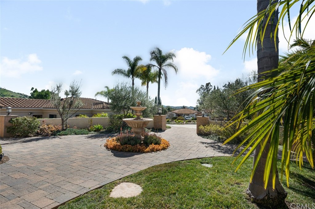 3724 Cedar Vale Way Fallbrook, CA 92028 - Photo 2 of 39 a swimming pool with outdoor seating and plants