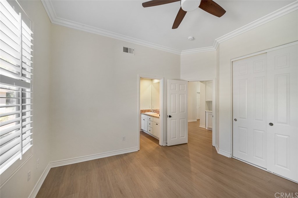 3724 Cedar Vale Way Fallbrook, CA 92028 - Photo 21 of 39 wooden floor in an empty room with a window