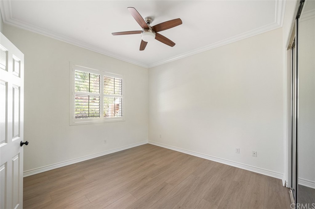 3724 Cedar Vale Way Fallbrook, CA 92028 - Photo 23 of 39 wooden floor in an empty room with a window