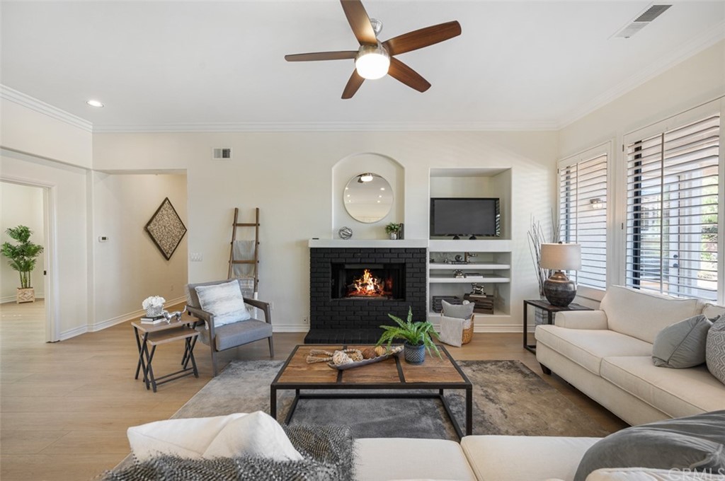 3724 Cedar Vale Way Fallbrook, CA 92028 - Photo 10 of 39 a living room with furniture and a fireplace