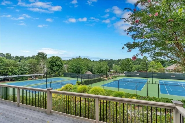 a view of a park with large trees