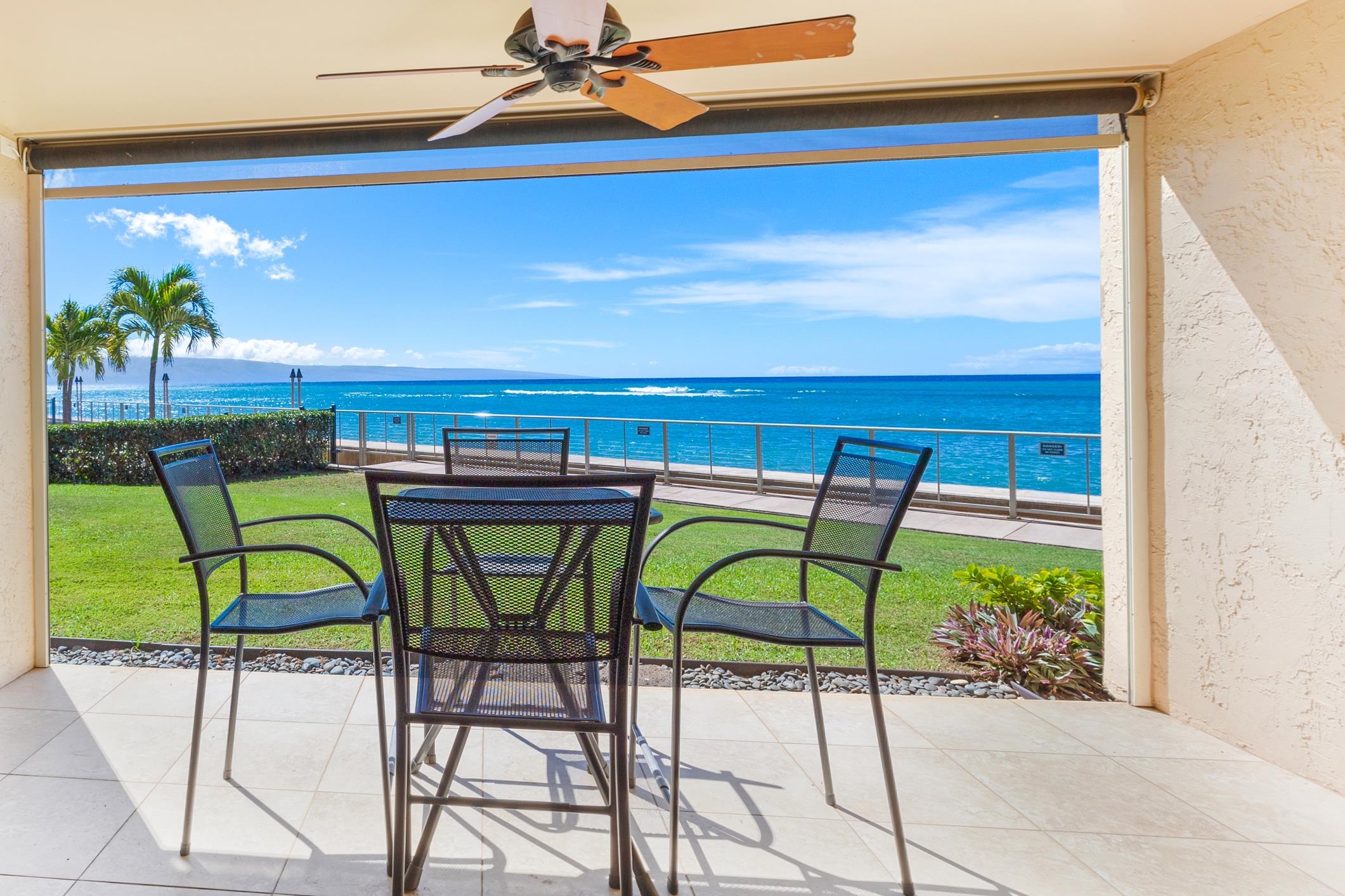 4401 Lower Honoapiilani Road, Unit A103 Lahaina, HI 96761 - Photo 18 of 45 a view of an chairs and table in the patio