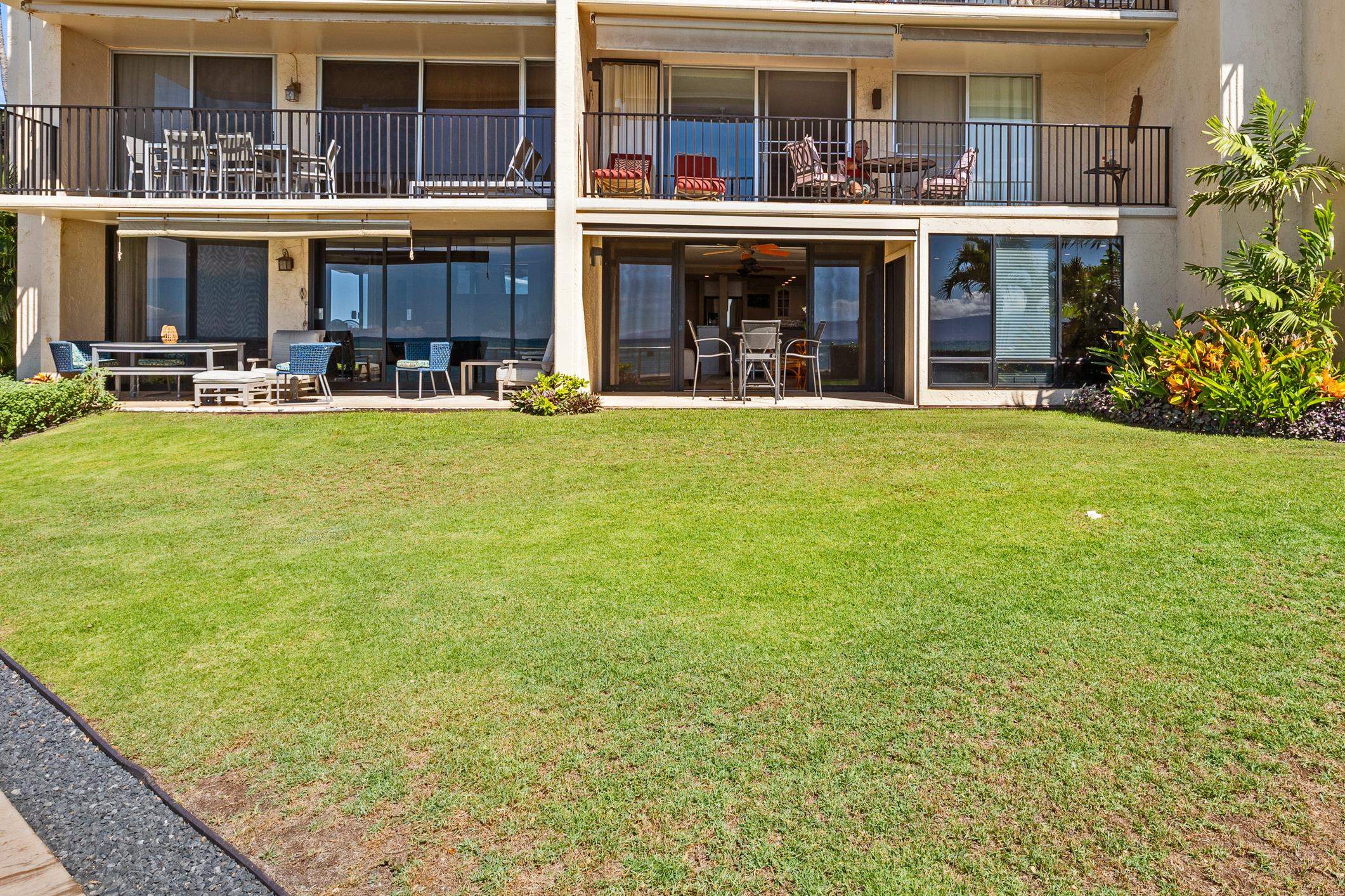 4401 Lower Honoapiilani Road, Unit A103 Lahaina, HI 96761 - Photo 20 of 45 front view of a building with a yard