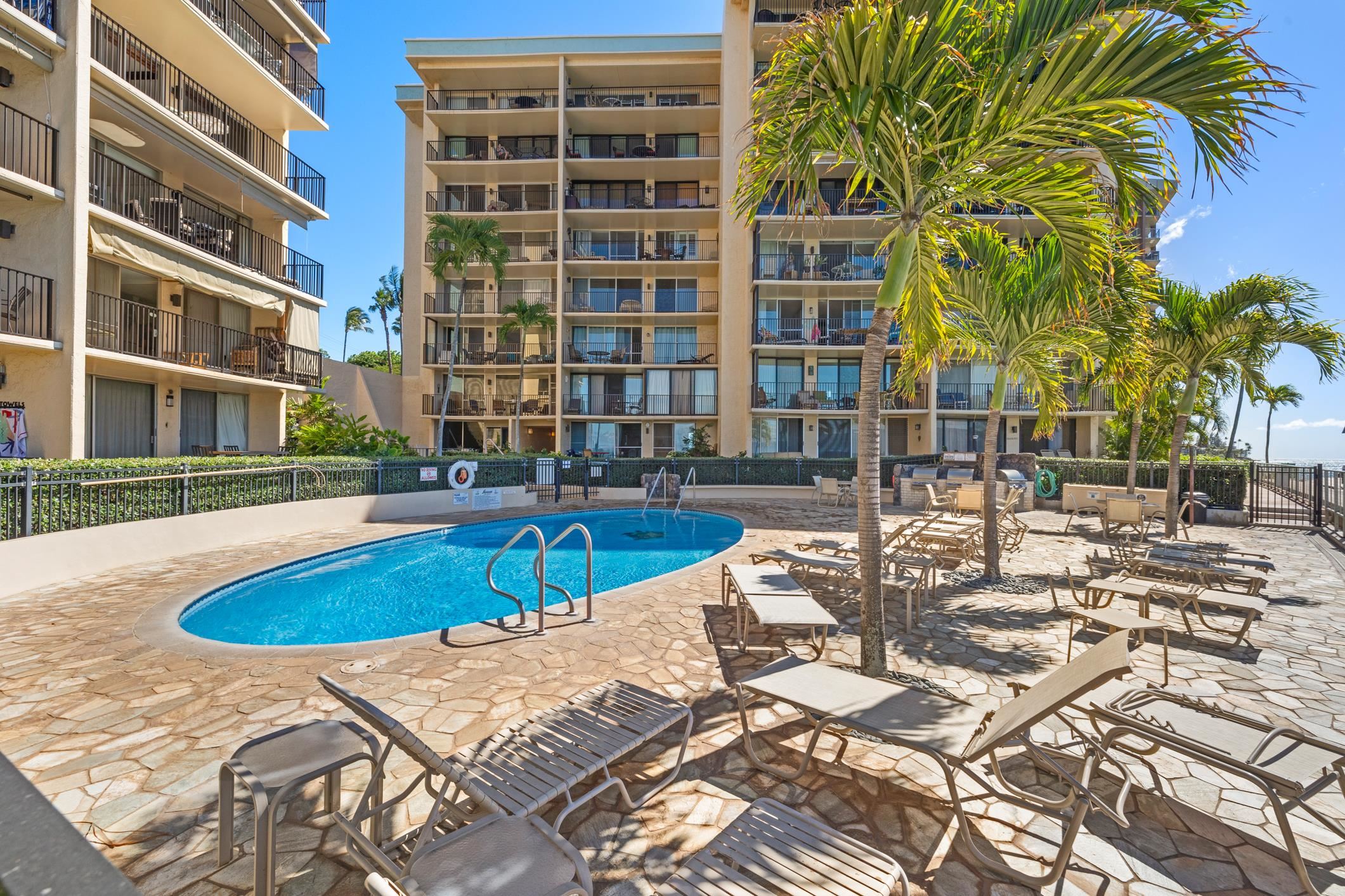 4401 Lower Honoapiilani Road, Unit A103 Lahaina, HI 96761 - Photo 22 of 45 a view of a swimming pool with a patio