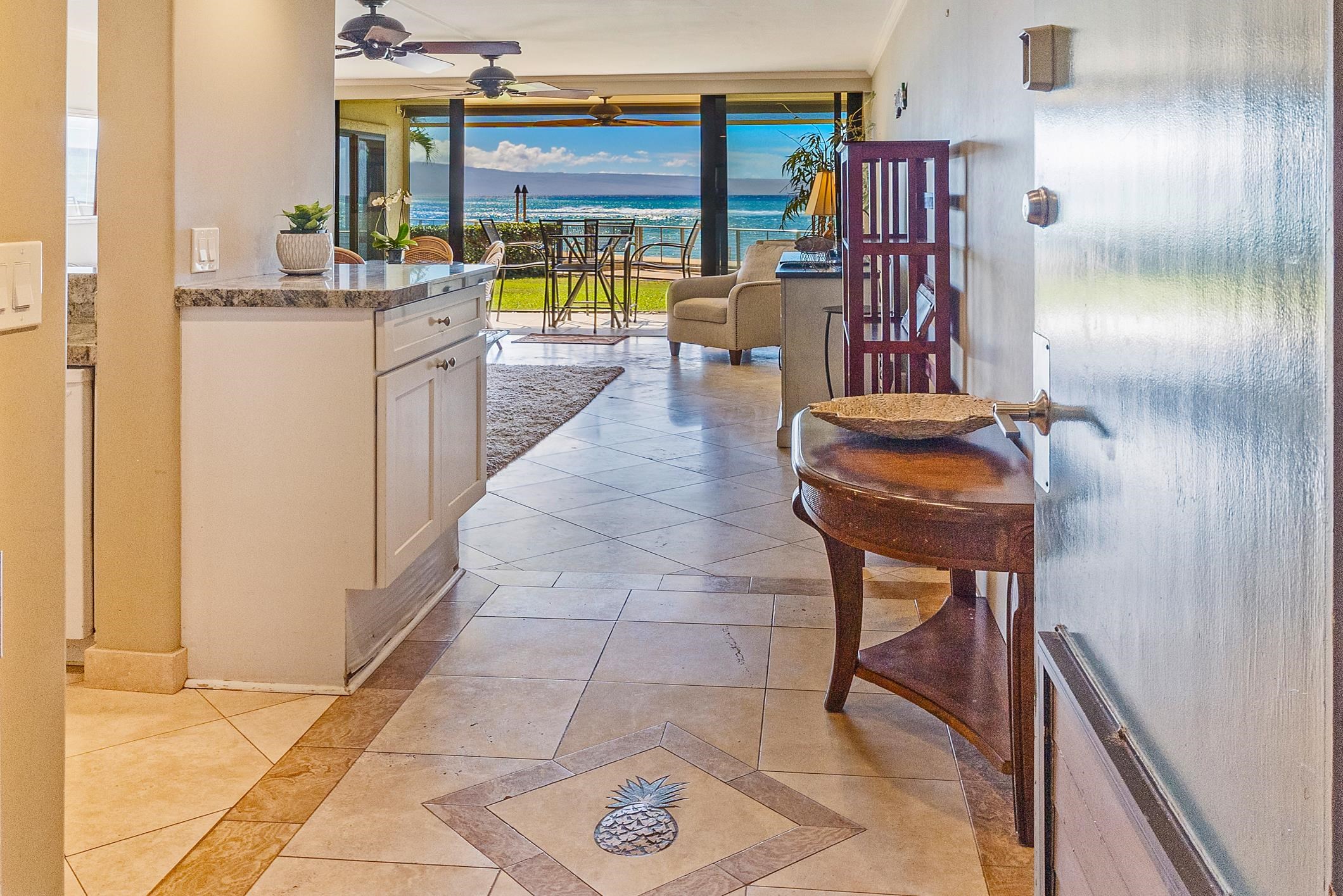 4401 Lower Honoapiilani Road, Unit A103 Lahaina, HI 96761 - Photo 31 of 45 a lobby with furniture and rug