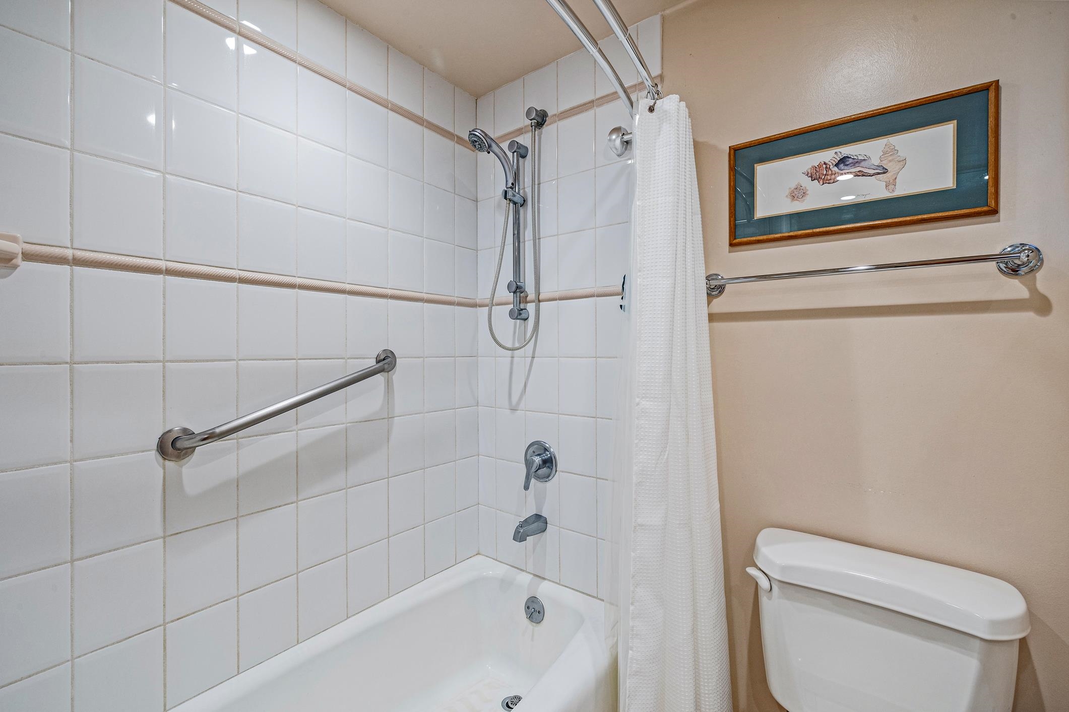 4401 Lower Honoapiilani Road, Unit A103 Lahaina, HI 96761 - Photo 41 of 45 a bathroom with a toilet and a shower