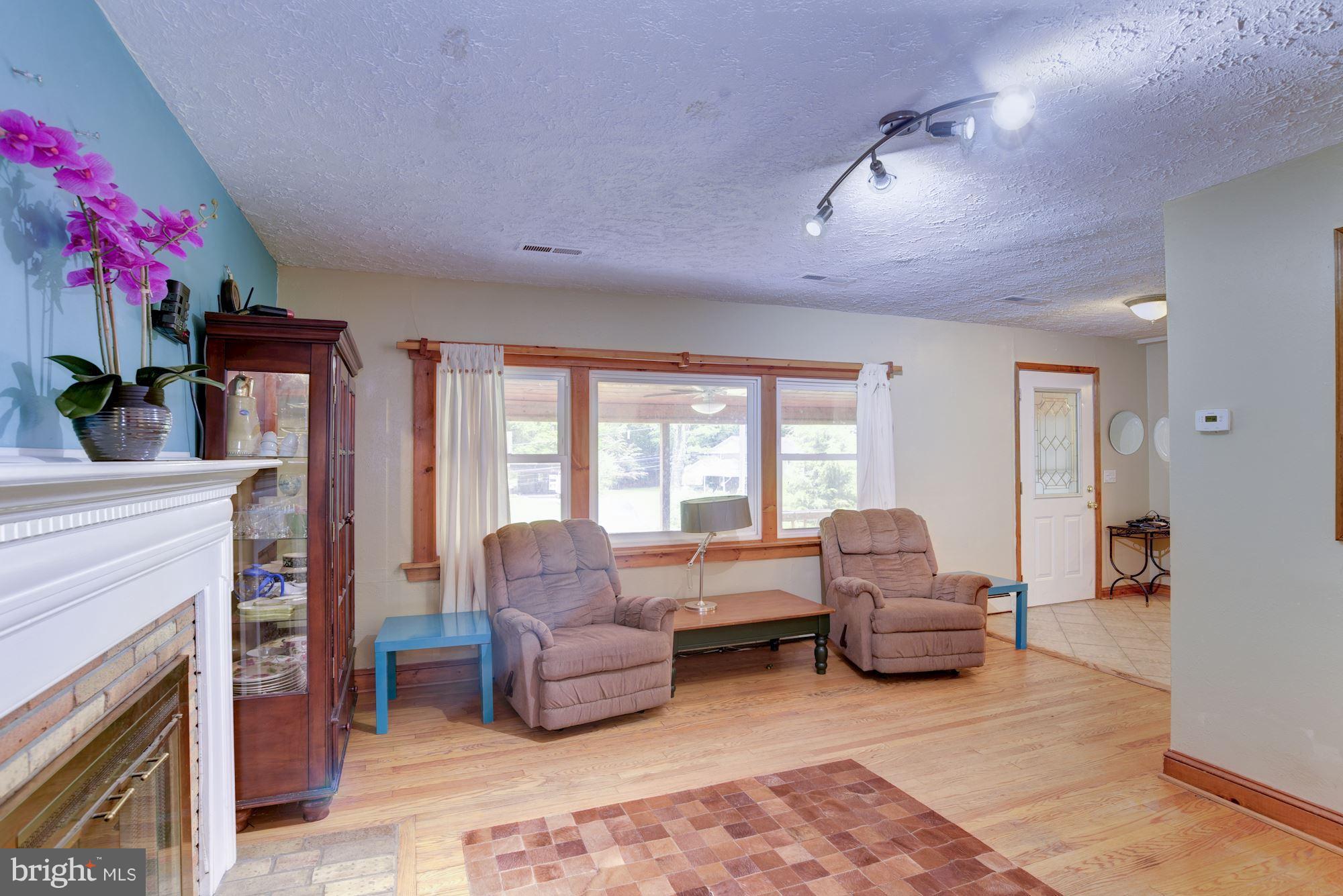 18318 Sharon Road Triangle, VA 22172 - Photo 2 of 16 Loads of natural light, easy flow for entertaining