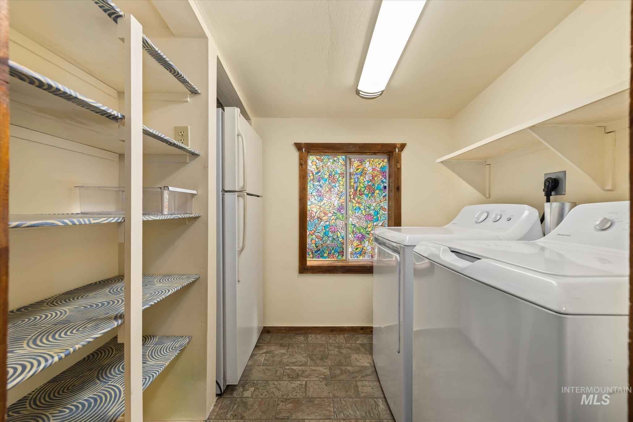 33-35 A Street Cascade, ID 83611 - Photo 14 of 20 New washer and dryer, 2nd fridge, and extra pantry space.
