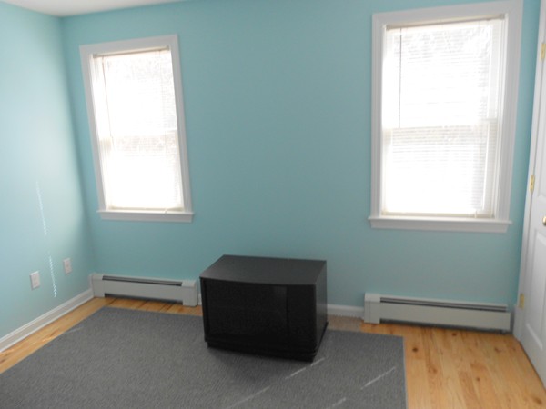 90-90B Waterhouse Road Bourne, MA 02532 - Photo 4 of 19 a room with window and a window