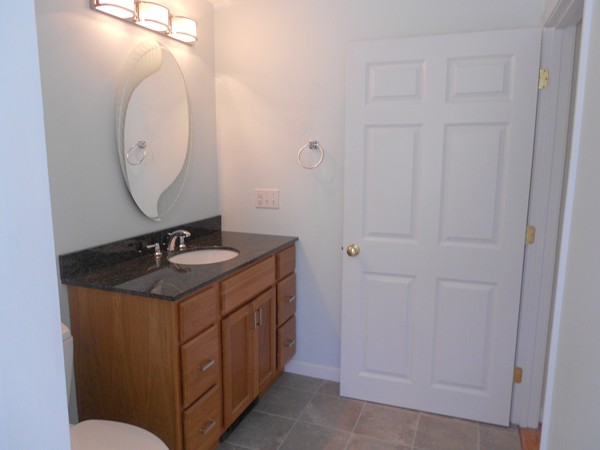 90-90B Waterhouse Road Bourne, MA 02532 - Photo 5 of 19 a bathroom with a sink and a mirror