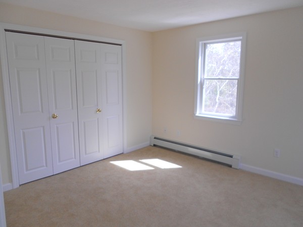 90-90B Waterhouse Road Bourne, MA 02532 - Photo 9 of 19 an empty room with windows